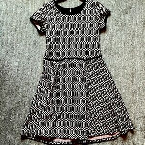 Black and tan geometric dress